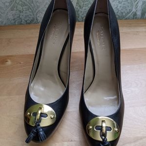 Black leather high heels shoes